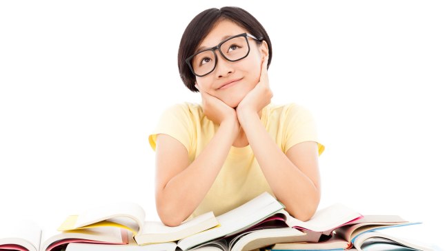 Photo of woman thinking about books