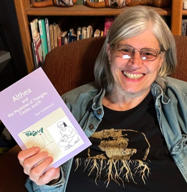 Sue VanHattum holds up her book in progress