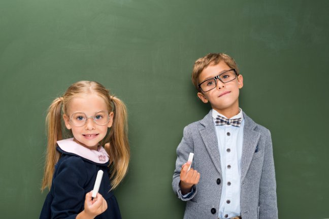 boy and girl ready to solve math puzzles