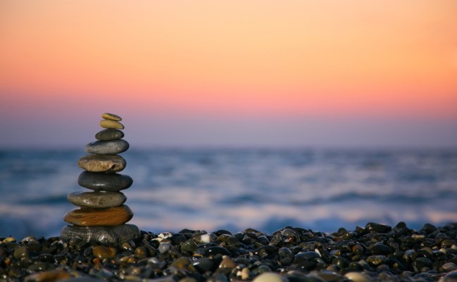 tower of rocks on a beach